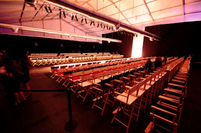 The runway room, which is separated with white draping from the rest of the tent, has 600 seats lining both sides of the catwalk.
