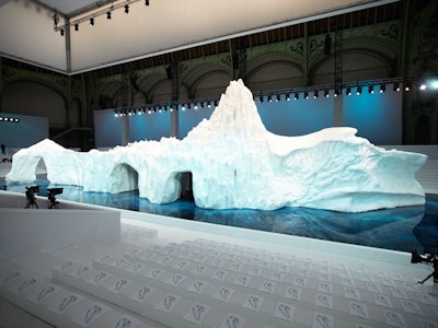 A backstage area was housed within the central ice structure, with models parading in and out of carved entrances.