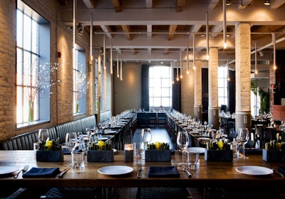 The dining room, filled with seating imported from Spain and glossy black tables, holds 150.