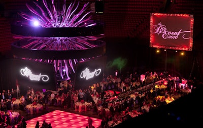 Wow Factor lowered the arena's scoreboard, with its inherent Medusa-style design element, to 15 feet above the floor so it could serve as a centerpiece for the dinner area.