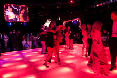 During dinner and for nearly an hour after, guests boogied on the illuminated dance floor from So Cool Event Rentals.