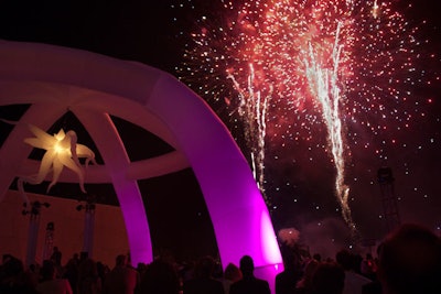 A 10-minute fireworks show from Michigan-based Colonial Fireworks signaled guests to move from the reception to the arena for dinner.