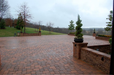 Three sets of glass doors in the barn open onto terraces with sweeping country views.