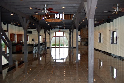 The main level has polished granite floors combined with rustic decor.
