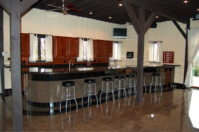 The seven-seat granite bar on the main level has two beer taps.