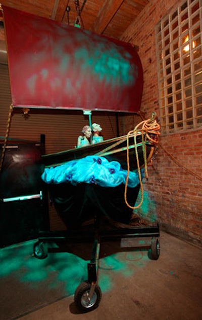 Props on display included a ship bathed in blue light.