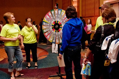 College House's Wheel of Fortune game offered prizes like tote bags, sweatshirts, and other collegiate merchandise.