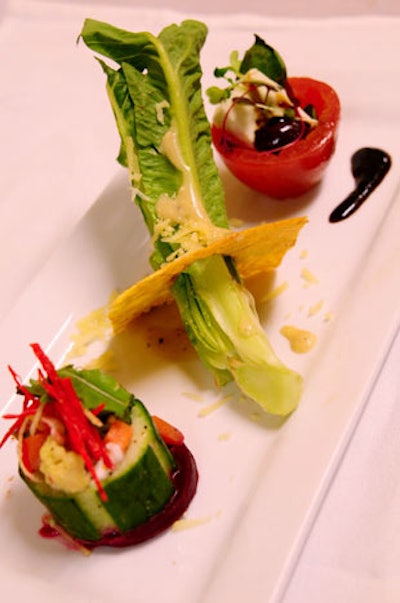 Barton G.'s salad course consisted of a mini Caesar salad, a mozzarella, tomato, and basil stack, and a mini chopped salad.
