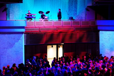 The Javi Orchestra performed above the stage door where guests entered the party.