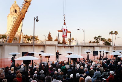 A 70-foot crane served as the backdrop at the groundbreaking event for the Wallis Annenberg Center for the Performing Arts.