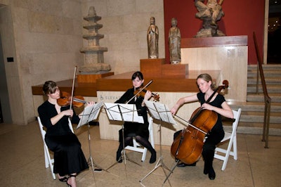 A classical trio played inside the museum's main entrance.