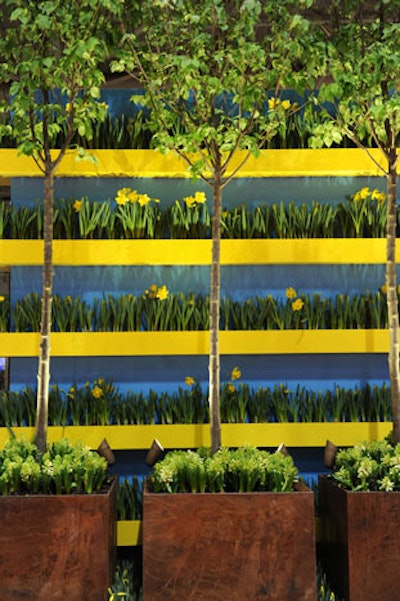 Many feature gardens went beyond aesthetics, such as the Canadian Cancer Society's 'Yellow Beacon' display of daffodils mixed with multimedia.