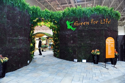 The opening display by Landscape Ontario, the horticultural trade association that supports Canada Blooms, included a living wall of soil and plants beside a waterfall.