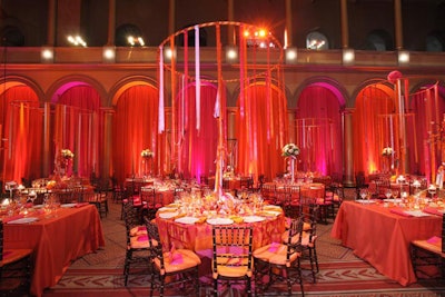 Hoops of ribbon streamers hung above tables.