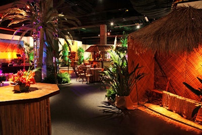 Among guests' after-dinner options was dancing and cocktails in a tiki-theme room, complete with flower leis, towering palm trees, and mai tais.