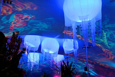 Decor pieces inspired by jellyfish hung from the top of the dinner tent.