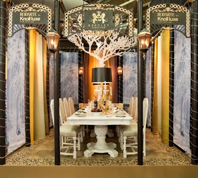 Bradley Stephens's dining space used fabric designed by Rodarte for Knoll in gold ombré and a light blue pattern of a winter scene.