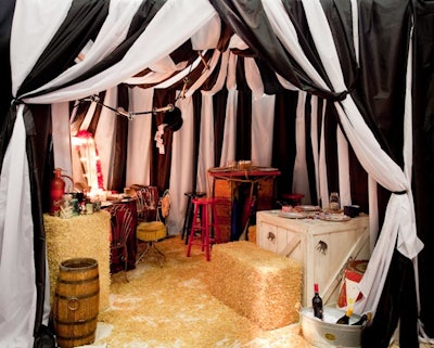 Students from the drama department at the Tisch School of the Arts at New York University worked with David Rockwell of the Rockwell Group to create an old-fashioned circus under a striped tent. Seating included bales of hay, stools, and an overturned bucket.