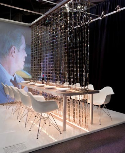 A curtain of 4,000 Swarovski crystals hung above David Rockwell's table, dividing it down the center. Lighting built into the floor uplit the crystals, creating a sparkling effect.