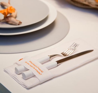 At Disney's table, napkins read 'What kind of world do you want to create?'