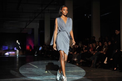 Models walked a runway in the underground garage at the Audi Downtown Toronto dealership.