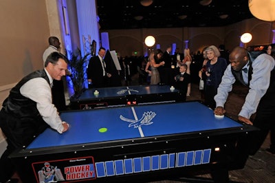 Orlando Magic team members played air hockey, billiards, and casino games with guests after dinner in a separate ballroom.