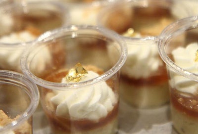 Inox pastry chefs produced a banana parfait topped with a swirl of cream and a gold leaf.