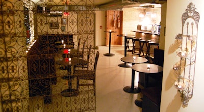 A wrought iron panel sits at the entrance to the tapas bar, one floor below Embrujo Flamenco on Danforth Avenue.
