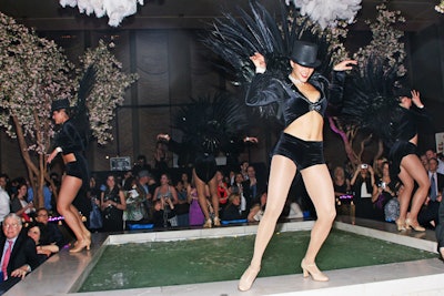 Showgirl-style dancers did a short routine in the pool room to kick off the Best New Chefs induction.