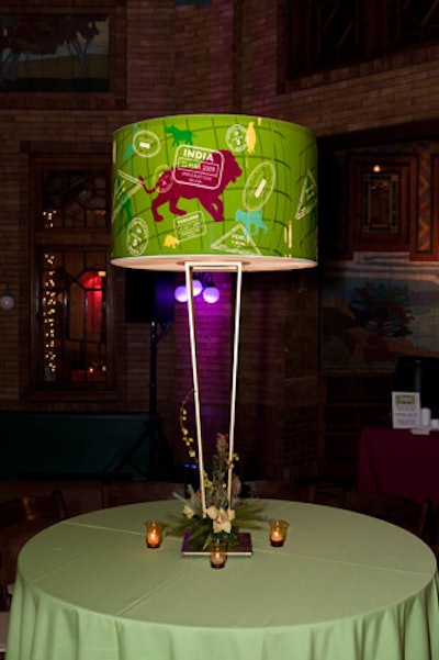 Lincoln Park Zoo's passport-themed Midwinter Party in March used oversize travel-stamped shades and slender, Moroccan-inspired lamps by Heffernan Morgan.