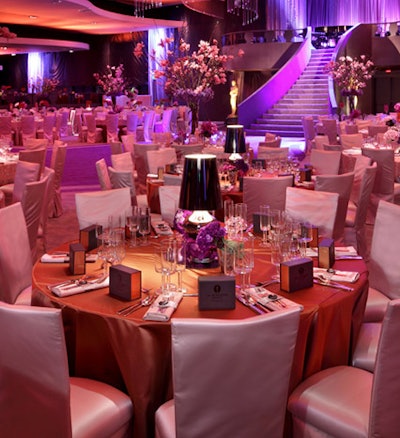 Mark's Garden topped tables with small lamps and multiple styles of floral arrangements at the Academy of Motion Picture Arts and Sciences' Governors Ball after the Oscars in February.