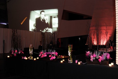 Pink flowers and black furnishings decorated a V.I.P. lounge in the Hyacinth Gloria Chen Crystal Court.