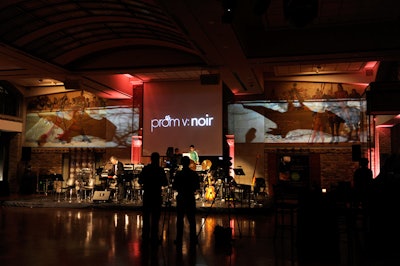 Video footage and projections of bats flanked the stage, where the Advocats Big Band performed during the party.