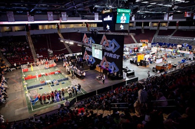 Boston University's Agganis Arena hosted the 2010 Boston First Robotics Competition Regional. The contest's footprint was divided into two parts: the 50- by 24-foot field and a pit area where students could tweak their robots.