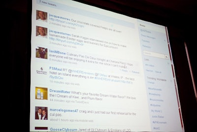 Chefs' tweets about the event streamed on a projection screen in the cocktail reception area.
