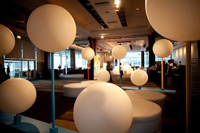 Producer and designer Shai Tertner filled the cocktail area with large white orbs.