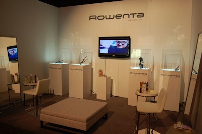 Stylists from Rowenta offer hair touch-ups in the brand's all-white booth.