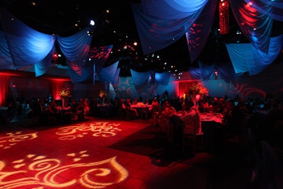 The venue's designers used aqua and red decor and lighting throughout the main event space.