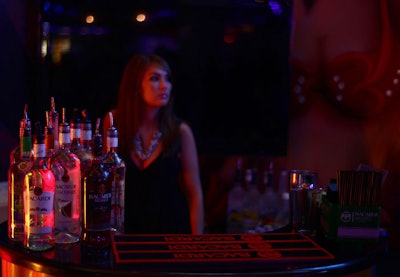 A bartender mixed cocktails using Bacardi spirits.