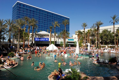 Bud Light logos appeared on signage and product throughout the poolside event space.