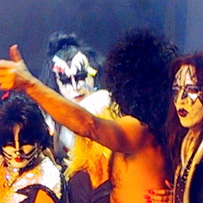 Kiss posed for pictures at the end of the fashion show and concert.