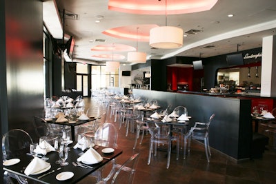 For presentations, the dining room at Tonino Lamborghini's Caffe Corsa has five flat-screen TVs suspended from the ceiling around the perimeter of the space.