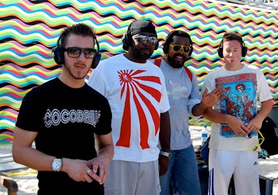 Tuzexx Productions staged its inaugural Hush beach party, a rave that used individual headphones instead of speakers to reduce noise ordinance issues, on Wednesday afternoon at the Doubletree Surfcomber Hotel.