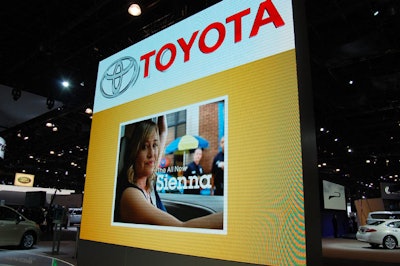 Toyota promoted it's new television and Internet ad campaign by playing the commercials on a large screen on the show floor.
