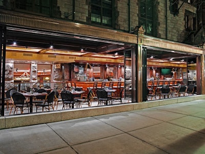 Sidewalk seating offers prime people-watching on Newbury Street.