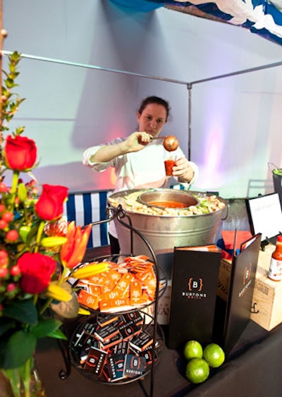 Denise Baron of Burton's Grill served seafood gazpacho at her station.