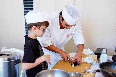 Nobu chefs taught young guests how to make sushi.