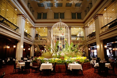 Designers placed a 16-foot-tall bird cage in the Walnut Room restaurant.
