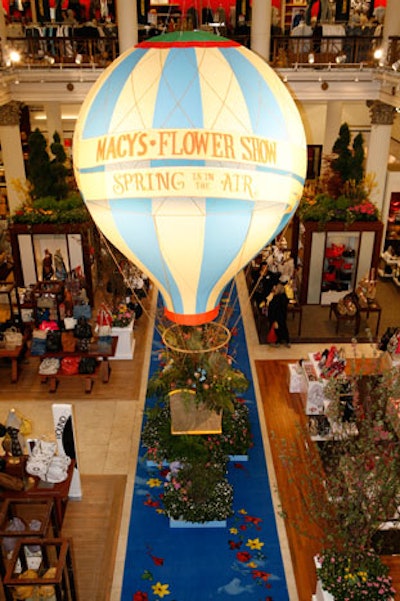 In the first-floor atrium, a hot air balloon is suspended from a cable that drops down from the 14th floor.