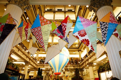 Nearly 200 kites form archways throughout the first floor, playing into the show's 'Spring is in the Air' theme.